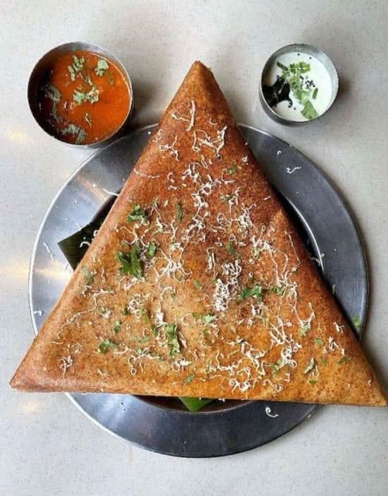 Cheese and chilli dosa with a melted cheese and green chilli filling